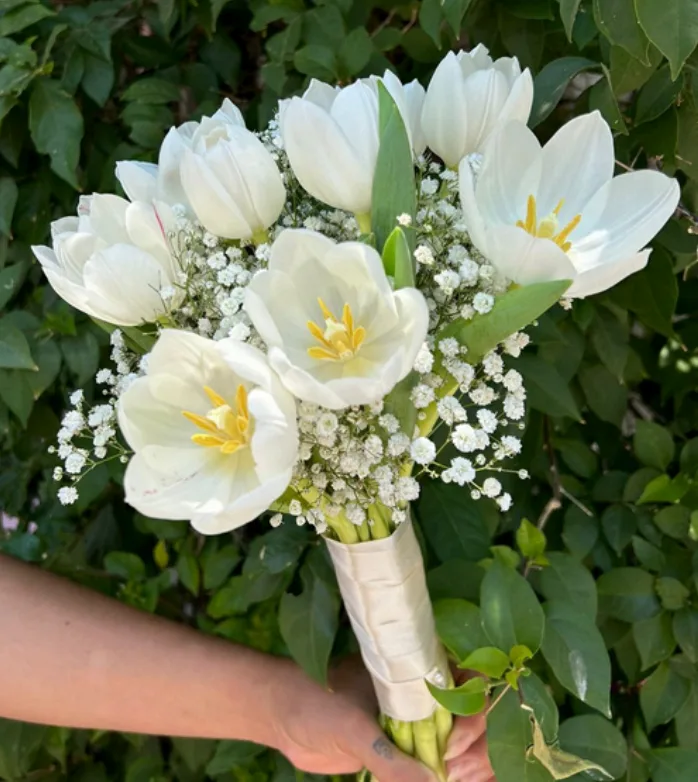White tulip bridal bouquet with baby's breath