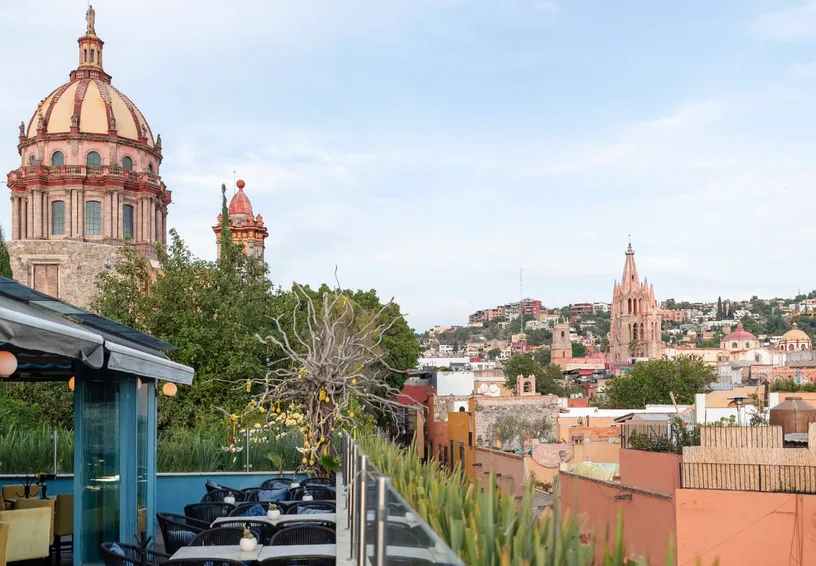 Rooftop view across the historic churches and skyline of San Miguel de Allende