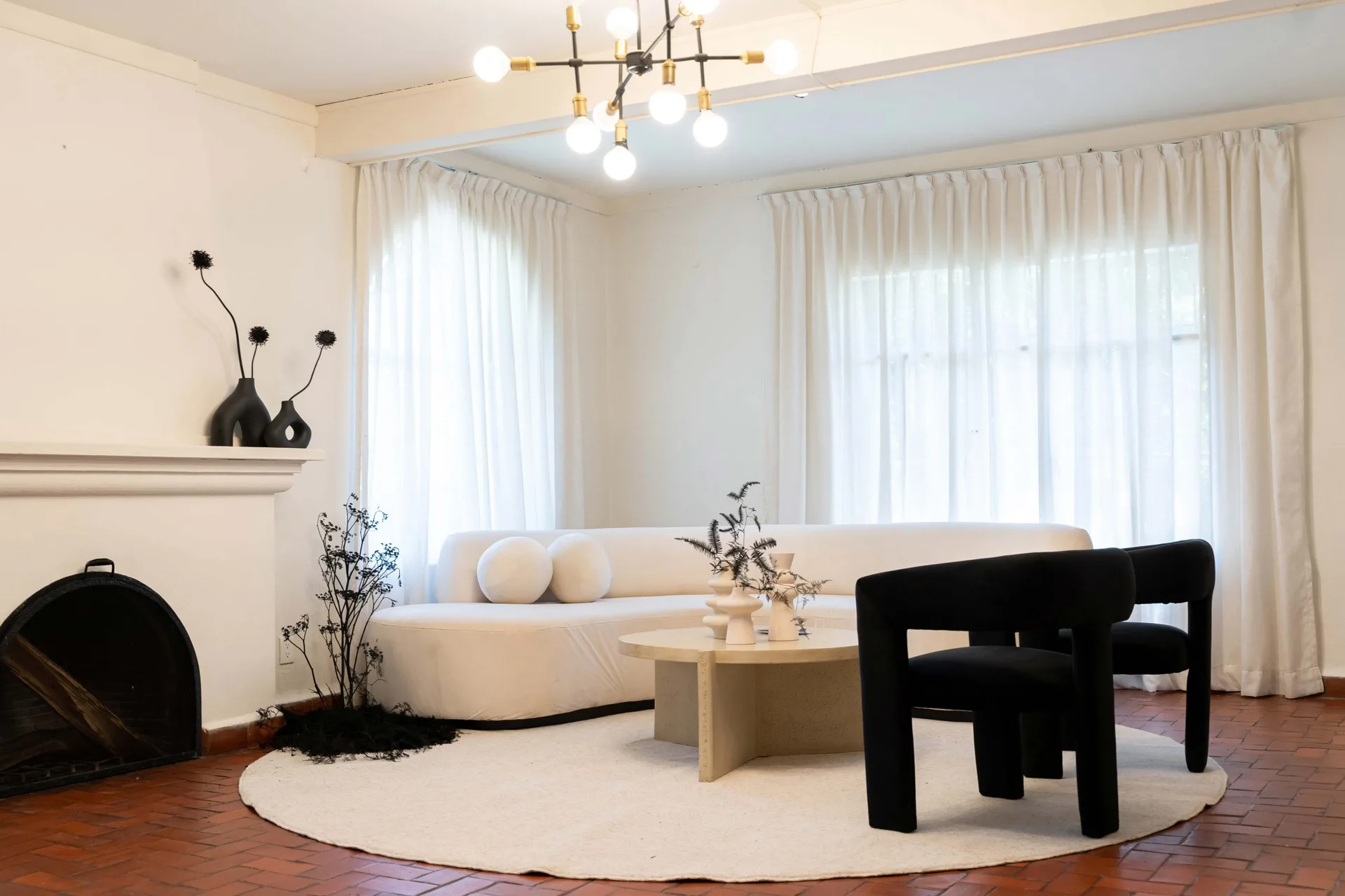 Designer lounge furniture arranged in a refined event interior