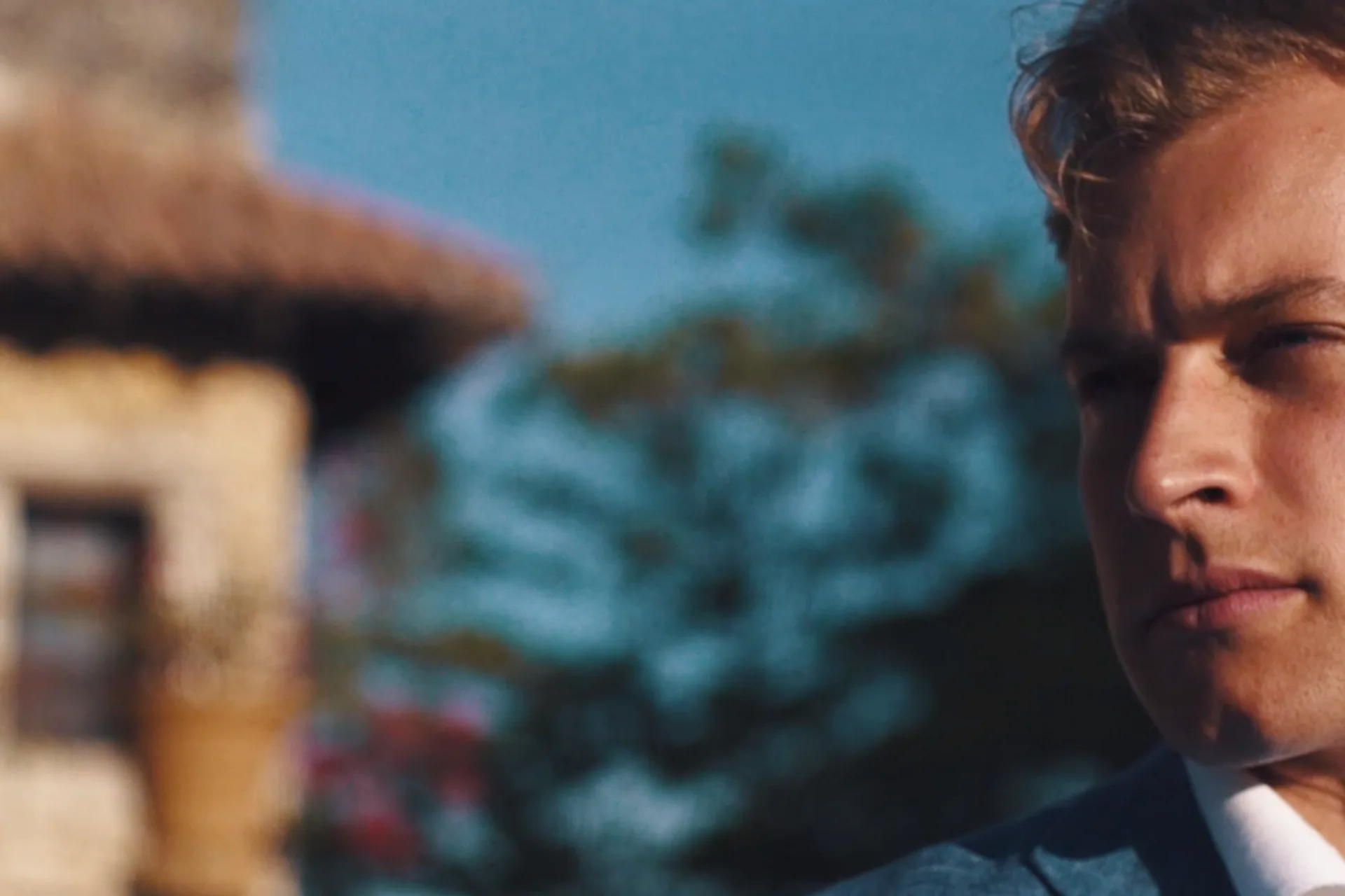 Intimate cinematic portrait of a wedding couple