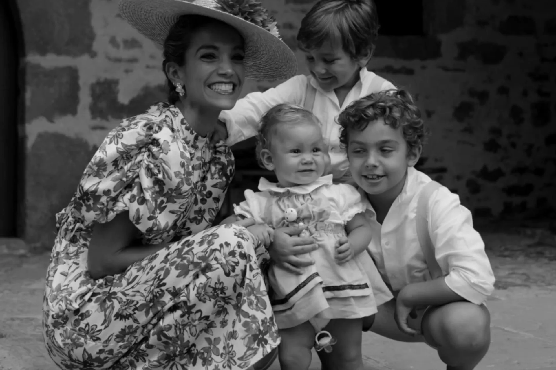 Family portrait captured during a wedding film