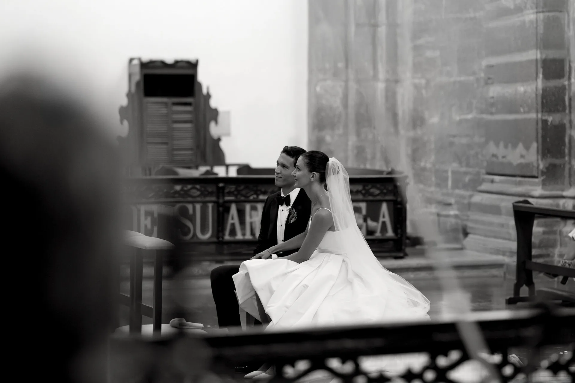 Wedding couple filmed outside a historic church