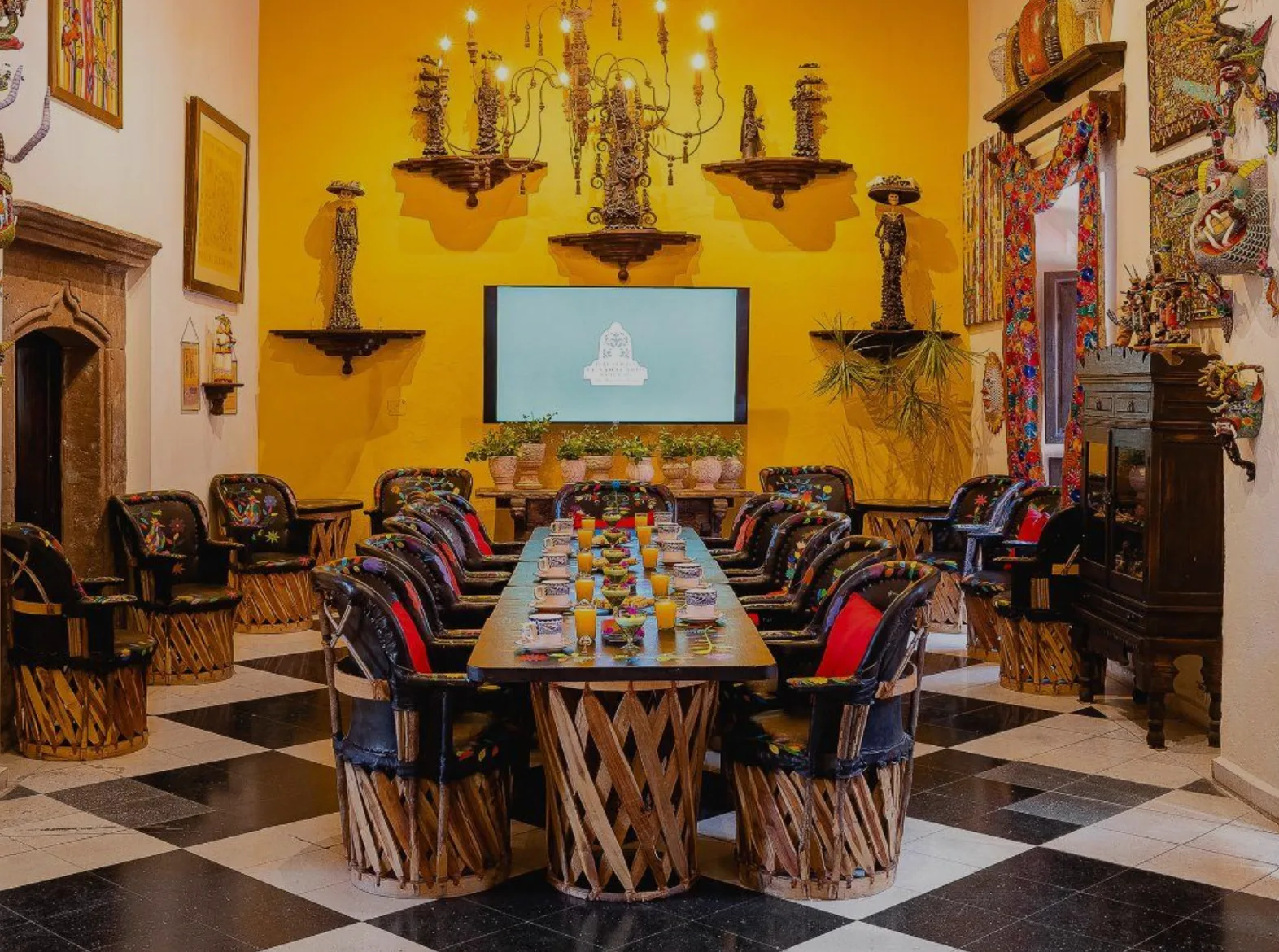 Meeting and dining room decorated with Mexican folk art at Hacienda El Santuario