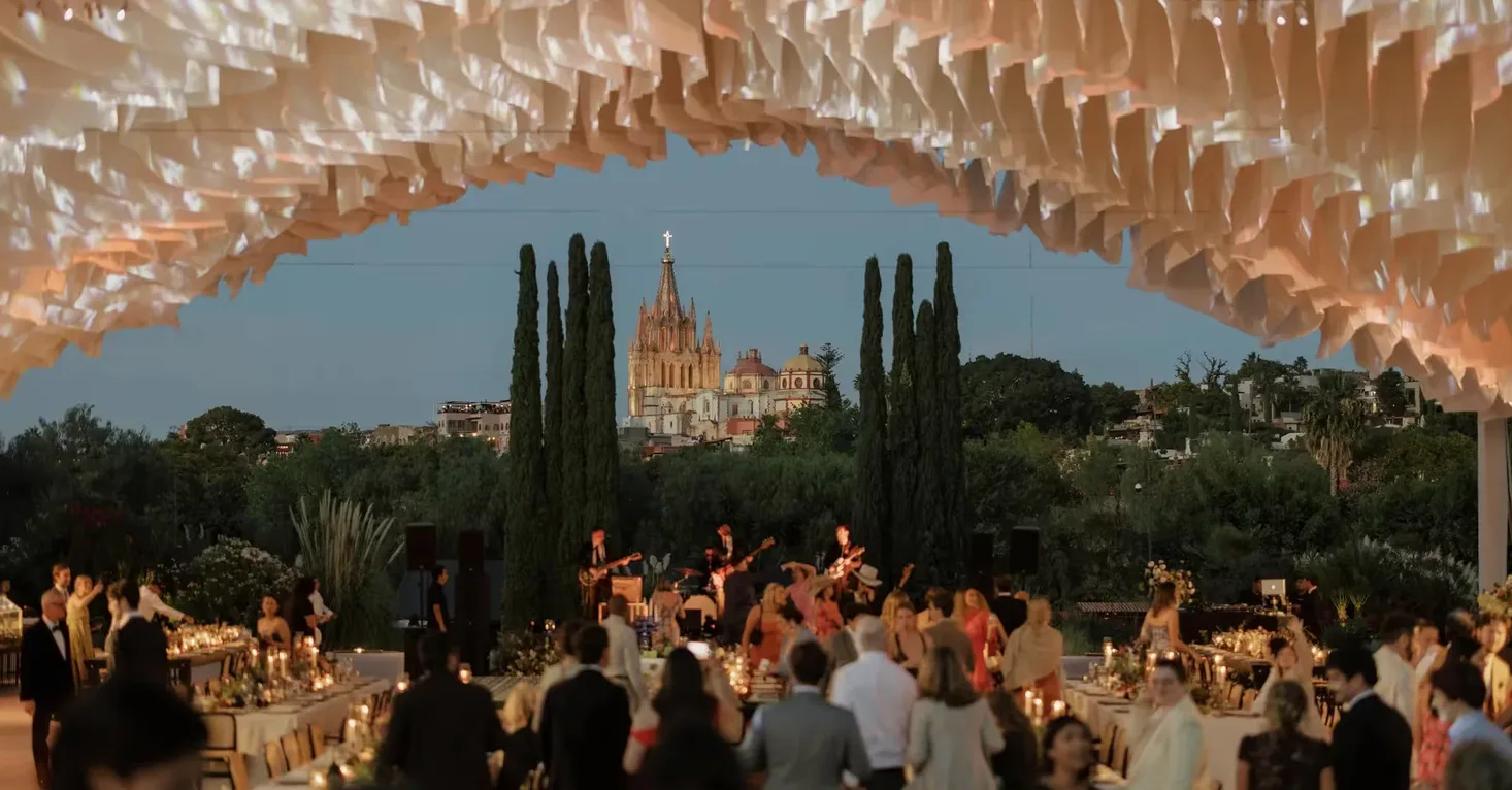 Evening garden wedding reception overlooking La Parroquia at Rosewood San Miguel de Allende